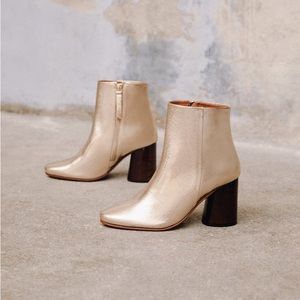 Golden high heel boots